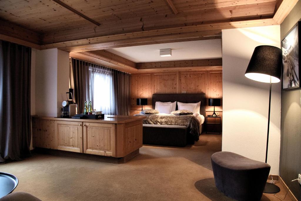 Postel nebo postele na pokoji v ubytování Hotel Madlein