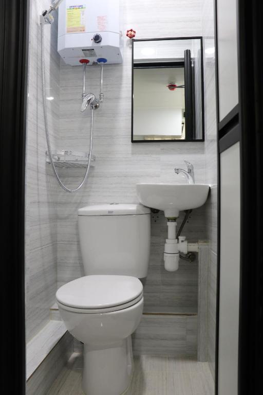 Koupelna v ubytování Super Guest House