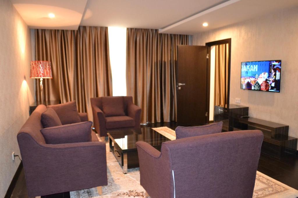 TV a/nebo společenská místnost v ubytování Pamir Palace