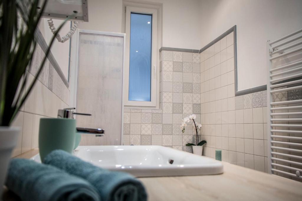 Kúpeľňa v ubytovaní Basilica A-Plus Suite