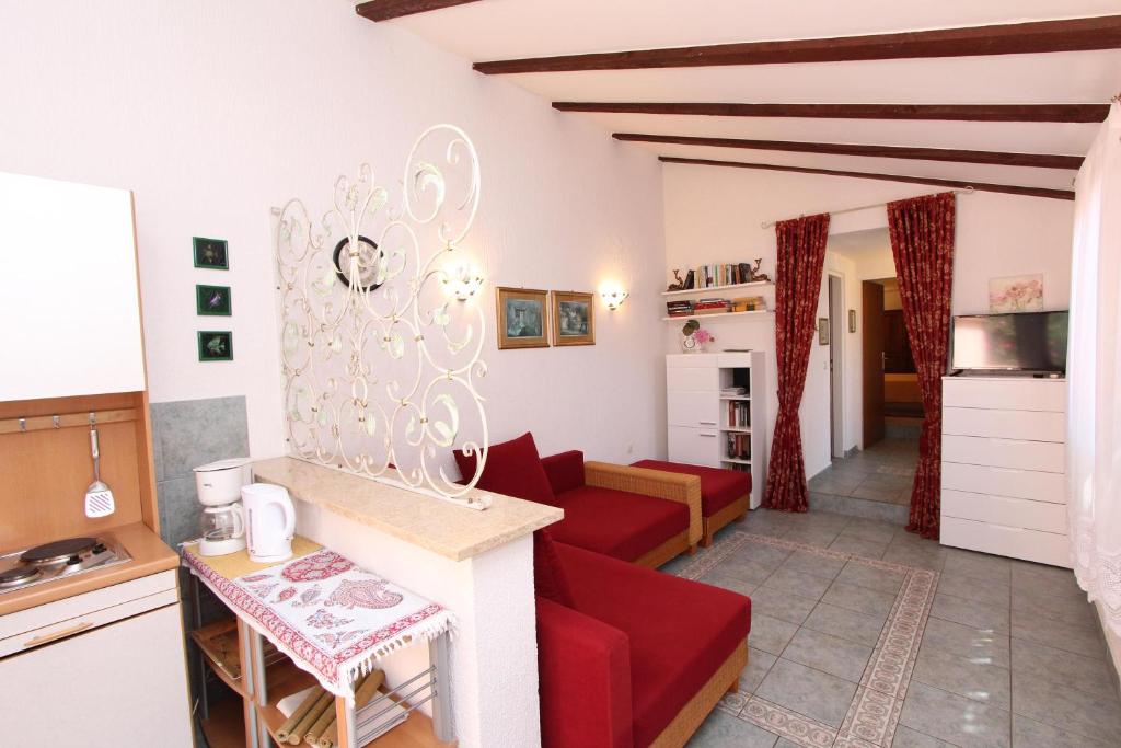Kuchyň nebo kuchyňský kout v ubytování Apartments Villa Lucu
