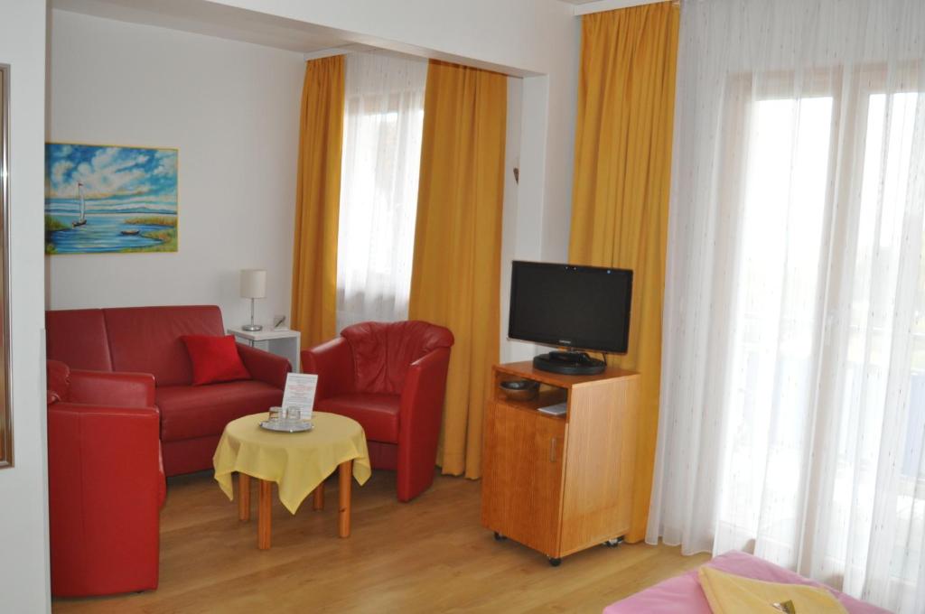 TV a/nebo společenská místnost v ubytování Apart Hotel Stadtgarten