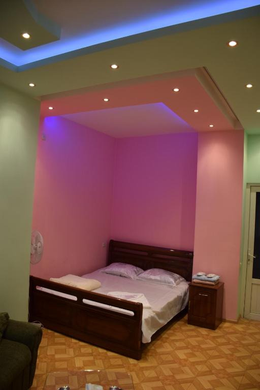 Letto o letti in una camera di Manand Hotel