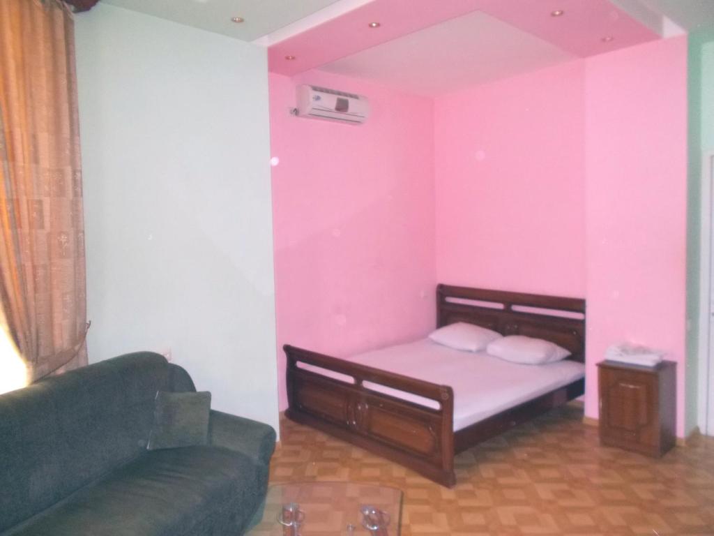 Letto o letti in una camera di Manand Hotel