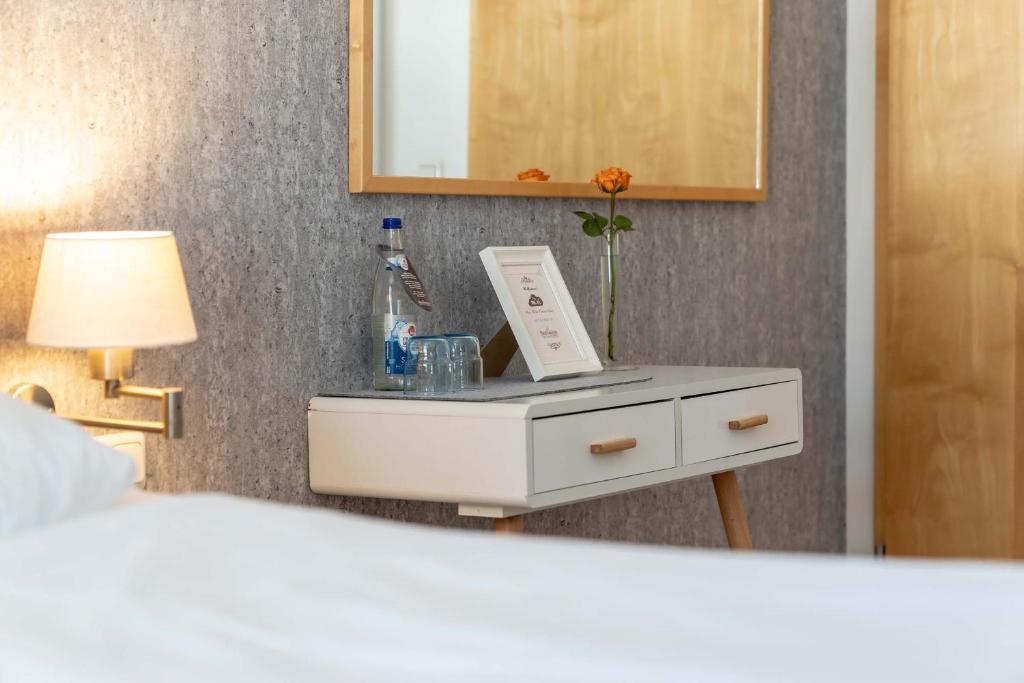 Postel nebo postele na pokoji v ubytování Hotel Am Dom