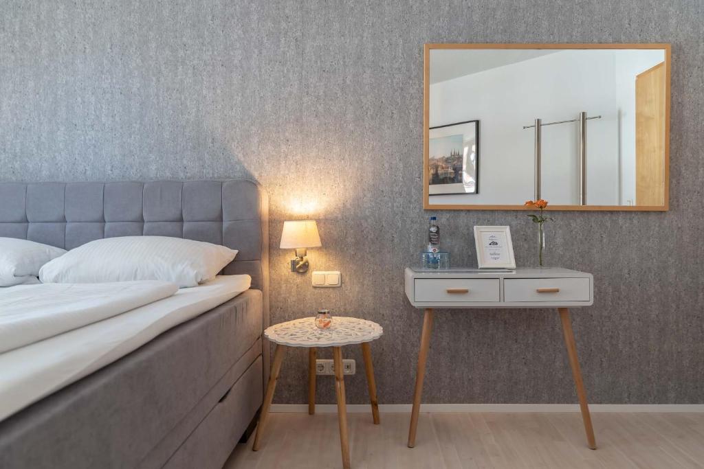 Postel nebo postele na pokoji v ubytování Hotel Am Dom