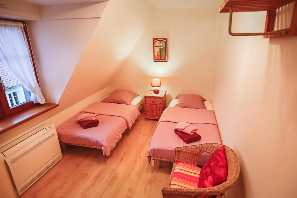 Postel nebo postele na pokoji v ubytování B&B Relais du Vigneron - Jean-Luc et Bruno Meyer