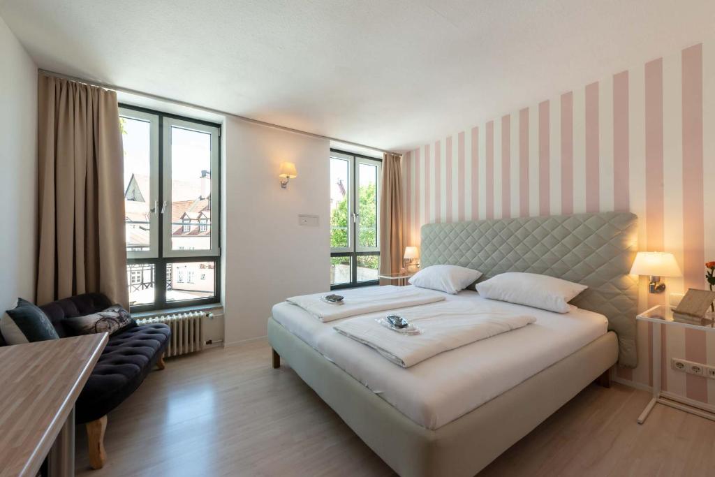 Postel nebo postele na pokoji v ubytování Hotel Am Dom