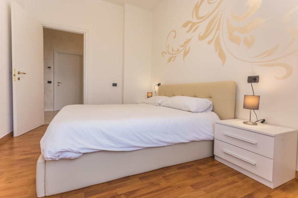Postel nebo postele na pokoji v ubytování LM House