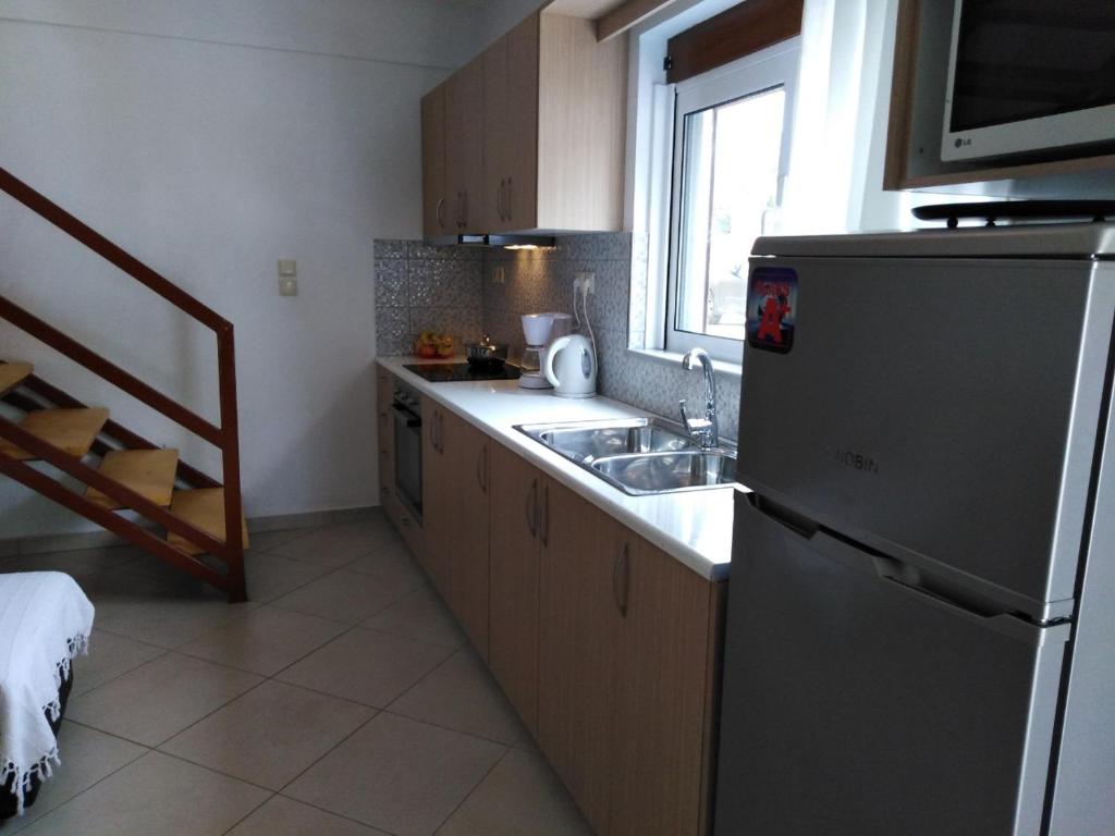 Kuchyň nebo kuchyňský kout v ubytování Sun Gazing Villas