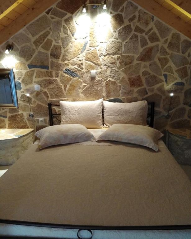 Postel nebo postele na pokoji v ubytování Sun Gazing Villas
