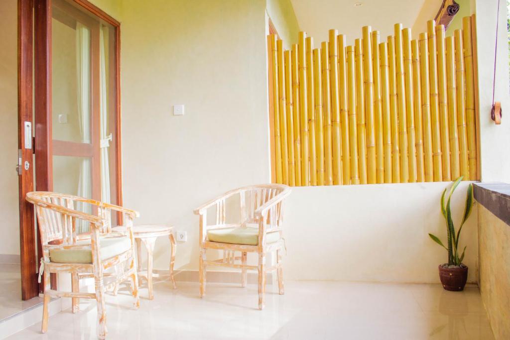 Posezení v ubytování Alam Grigis Ubud