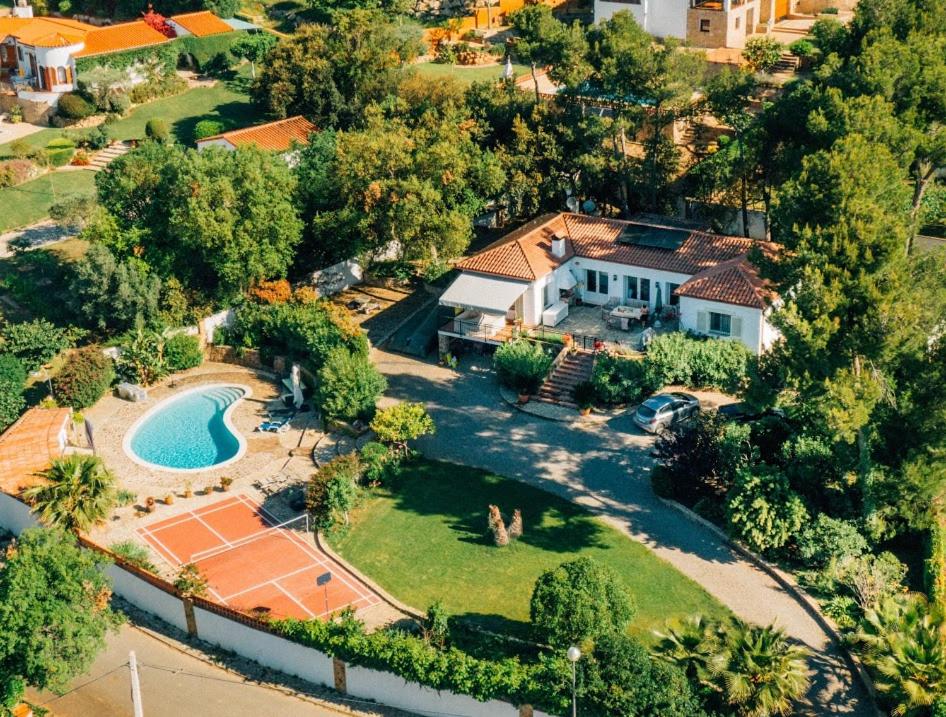 an aerial view of a house with a swimming pool at Villa Sotavent in Vall-Llobrega