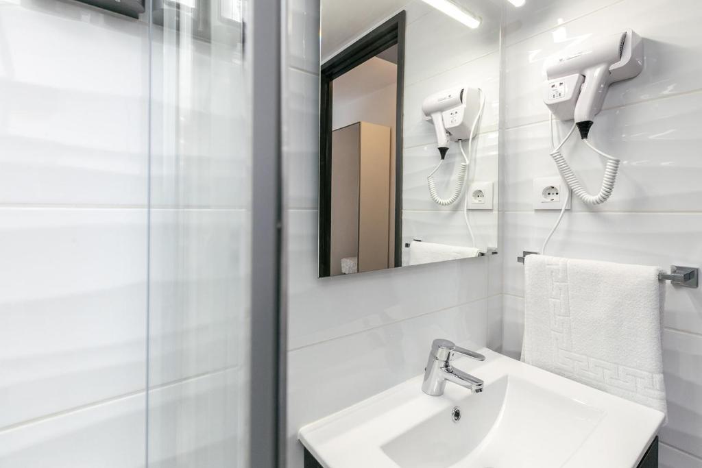 Koupelna v ubytování Empuria Beach D-Luxe
