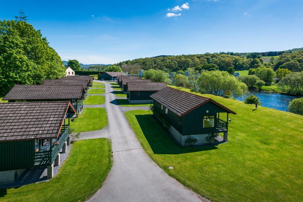 an overhead view of a row of cottages at Logierait Pine Lodges in Pitlochry