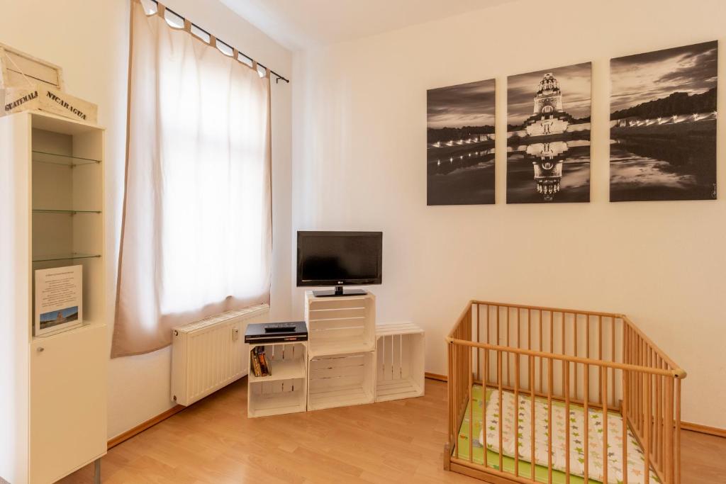 TV a/nebo společenská místnost v ubytování Hotel Markgraf Leipzig