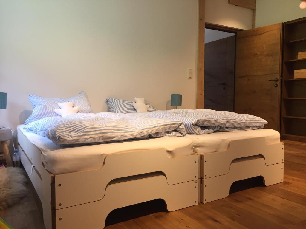 Postel nebo postele na pokoji v ubytování Alpin Chalet Kern