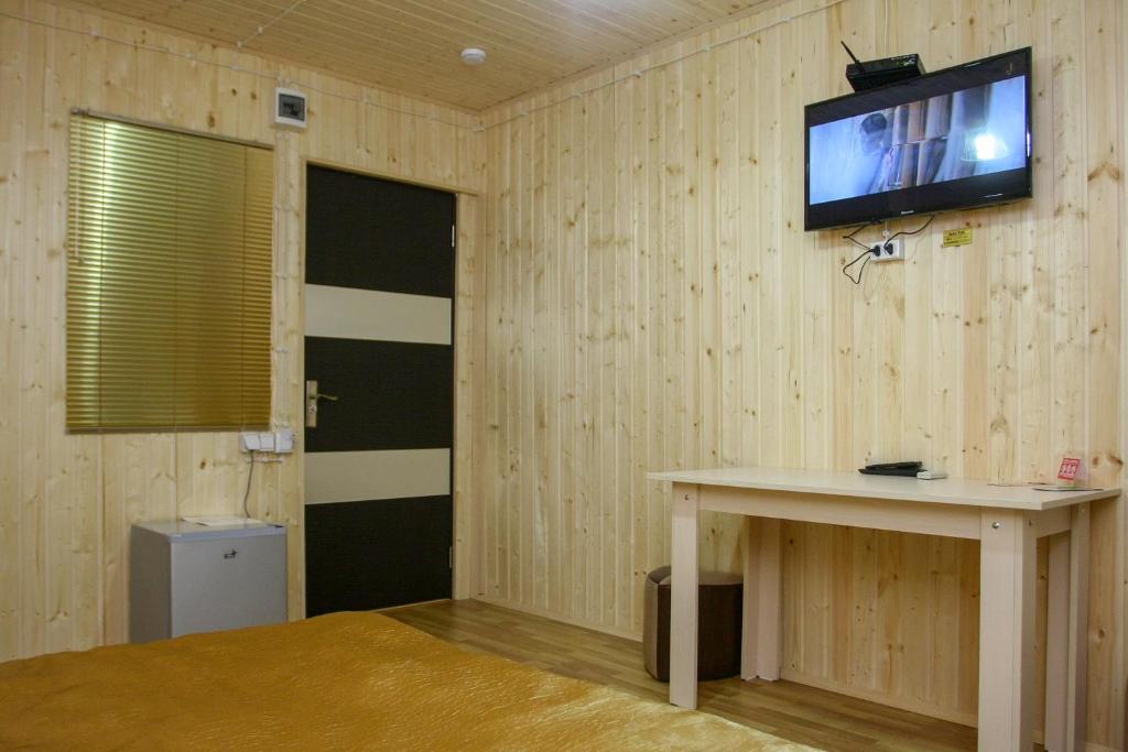 TV a/nebo společenská místnost v ubytování Park Hotel Kutaisi