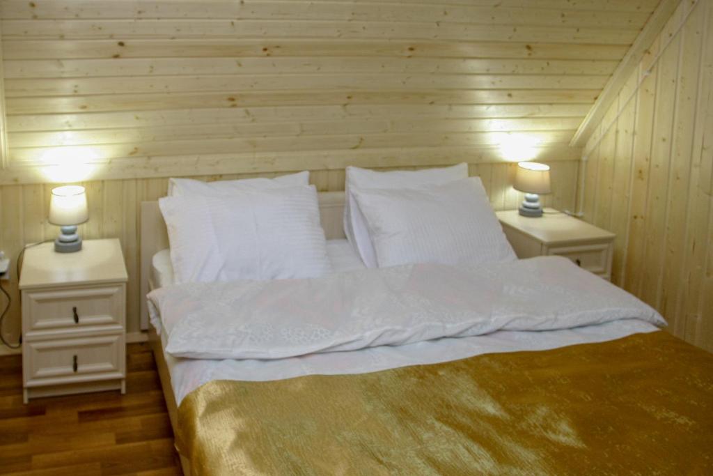 Postel nebo postele na pokoji v ubytování Park Hotel Kutaisi