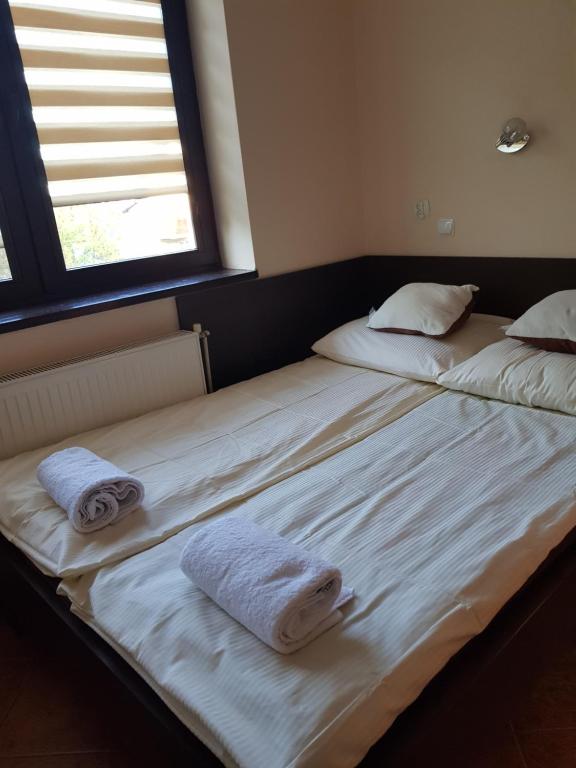 Posteľ alebo postele v izbe v ubytovaní Pokoje Gościnne u Lidki