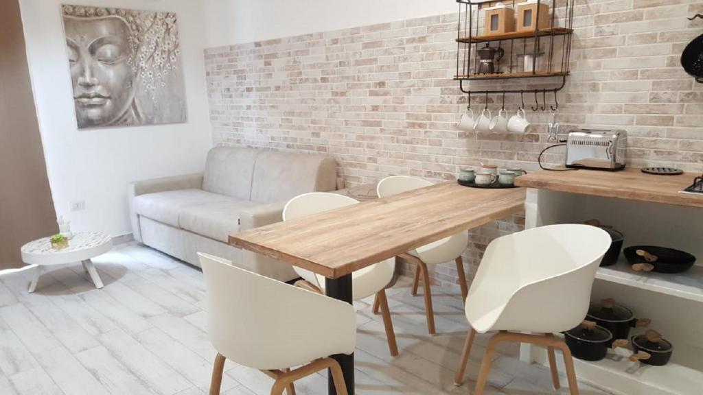 Kuchyň nebo kuchyňský kout v ubytování Amelia Apts & Rooms