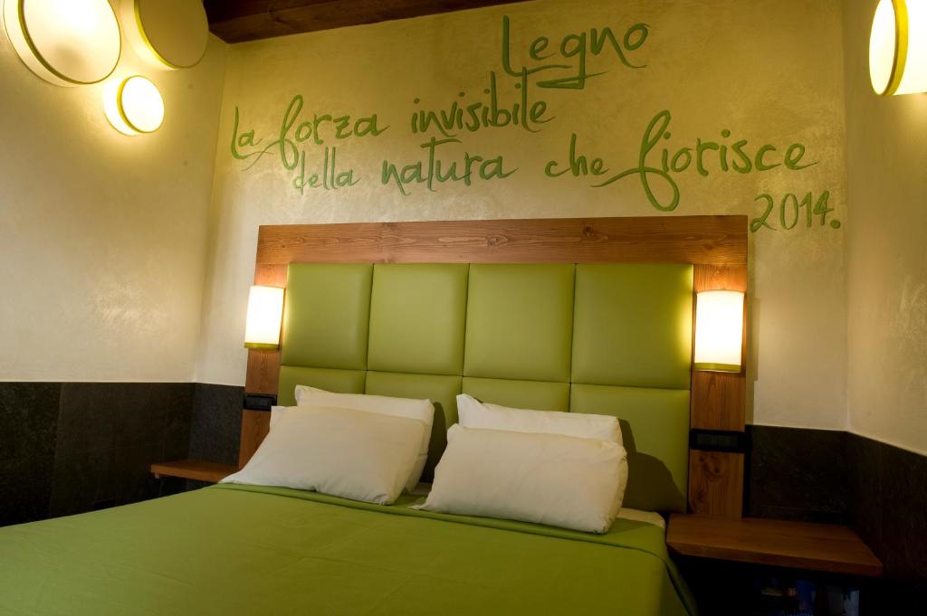 Postel nebo postele na pokoji v ubytování B&B 7 Vizi
