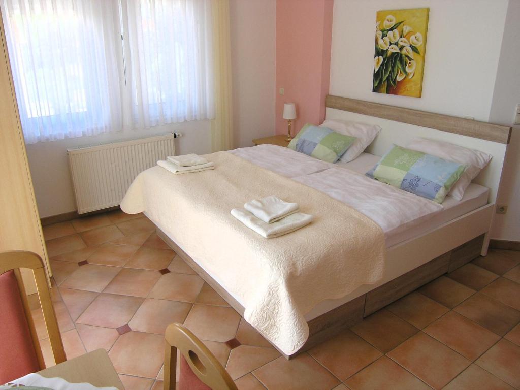 Posteľ alebo postele v izbe v ubytovaní Apartments Kristina