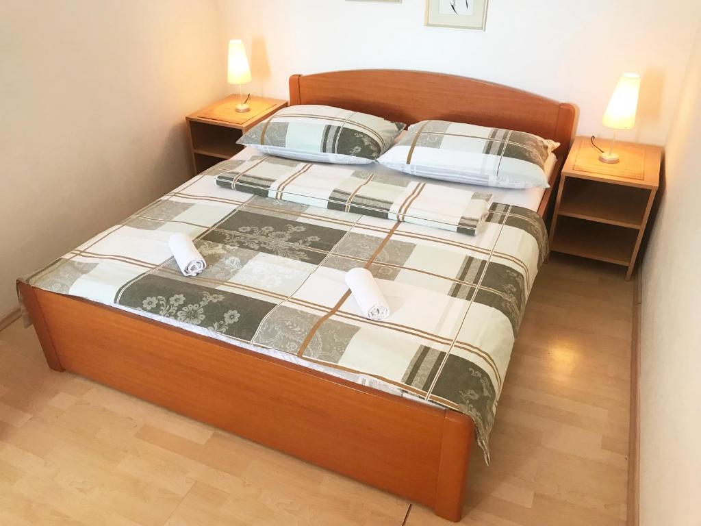 Кровать или кровати в номере Apartment & Rooms Riva