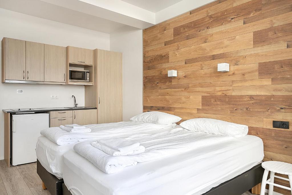Postel nebo postele na pokoji v ubytování Stay Apartments Einholt