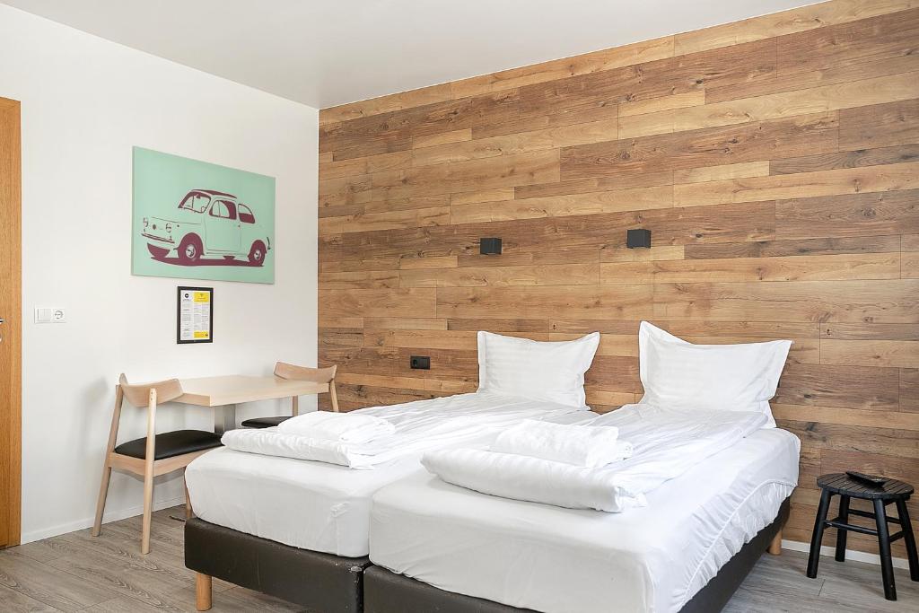 Postel nebo postele na pokoji v ubytování Stay Apartments Einholt