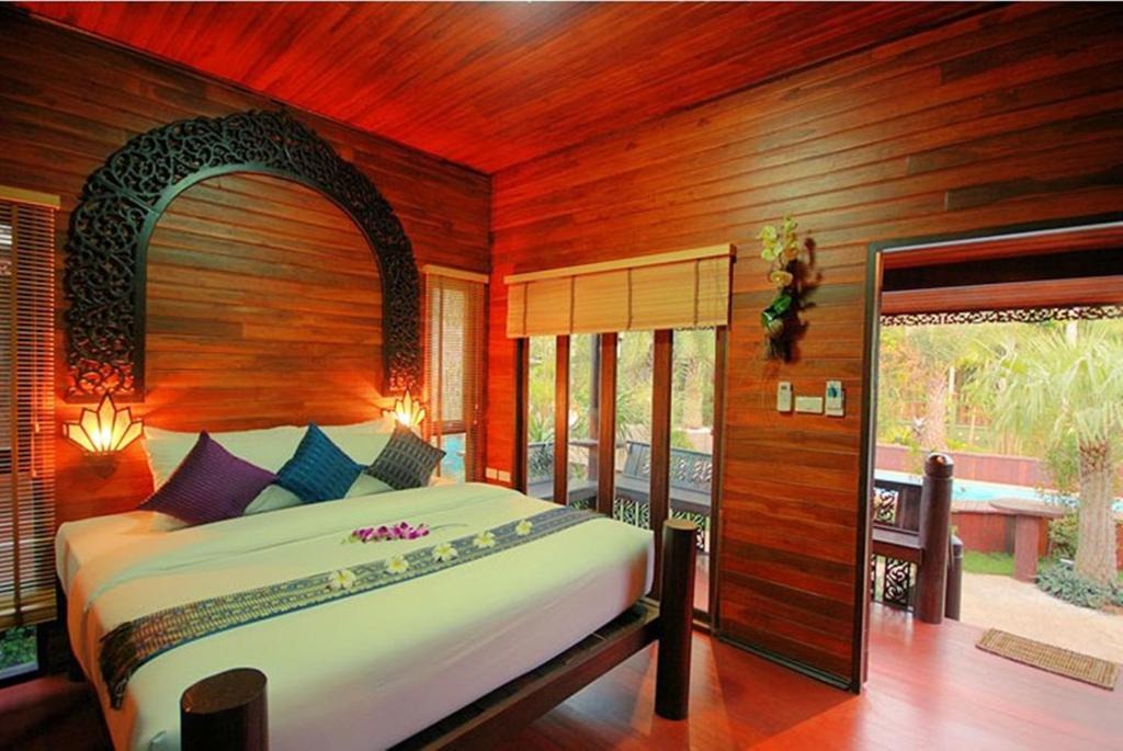 Postel nebo postele na pokoji v ubytování Baan Habeebee Resort