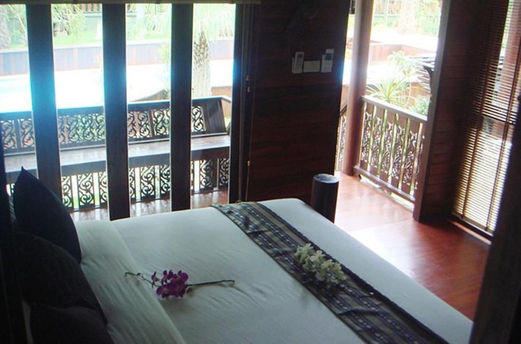 Postel nebo postele na pokoji v ubytování Baan Habeebee Resort