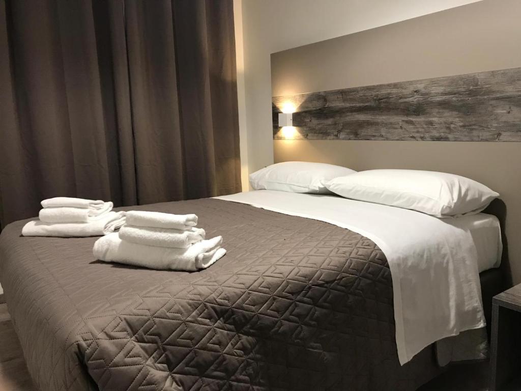 A bed or beds in a room at BorgoNove