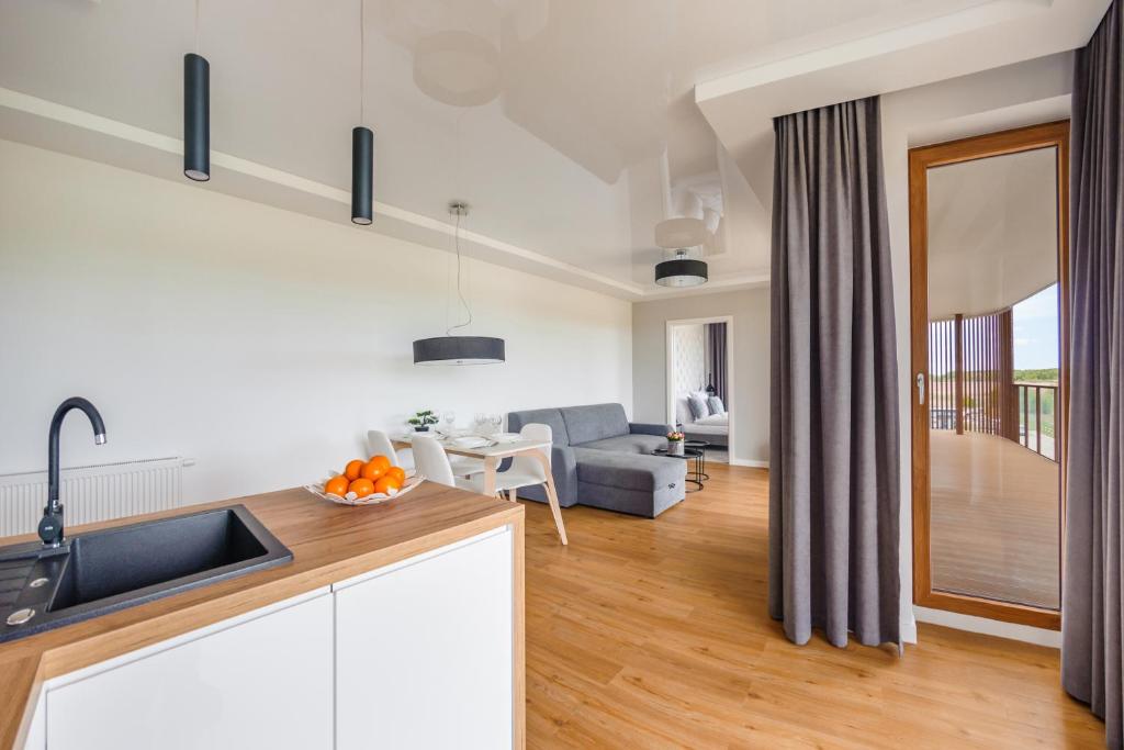 Apartamenty Sun & Snow Kołobrzeg Resorts z basenem - One-Bedroom Apartment