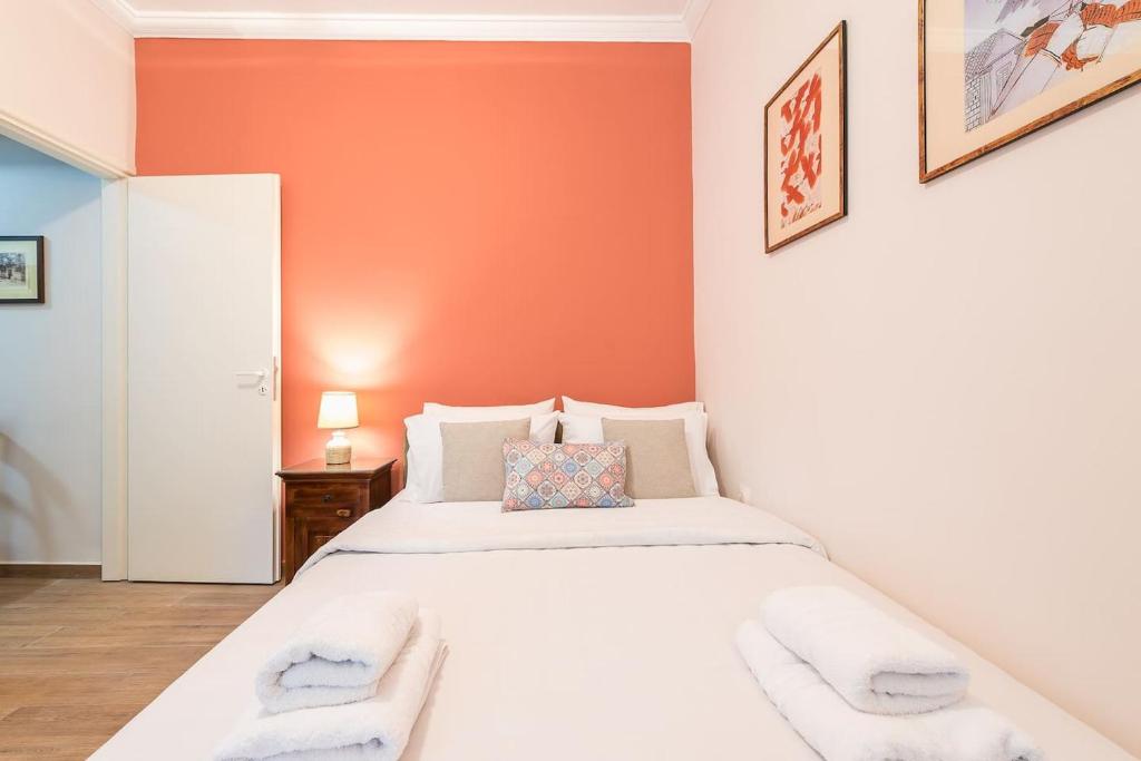 Postel nebo postele na pokoji v ubytování Cozy studio 5mins walk from Acropolis museum