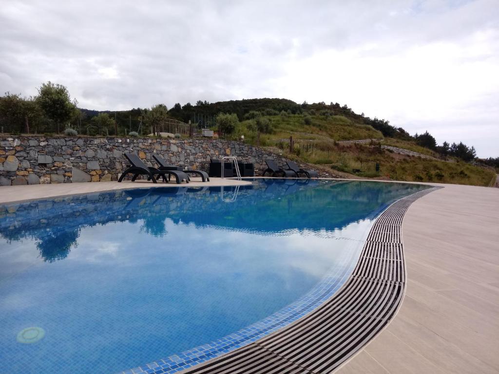 Bazén v ubytovaní Appartamento Leccino con piscina - Riva Trigoso alebo v jeho blízkosti