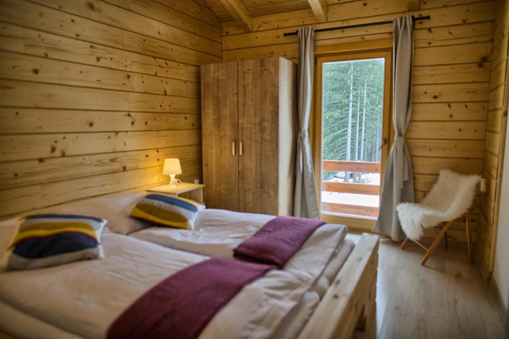 Postel nebo postele na pokoji v ubytování Zruby Pod Chopkom
