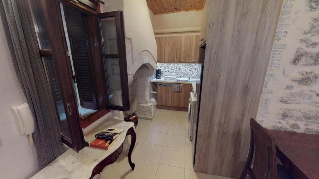 Kuchyňa alebo kuchynka v ubytovaní Porto Enetiko Suites