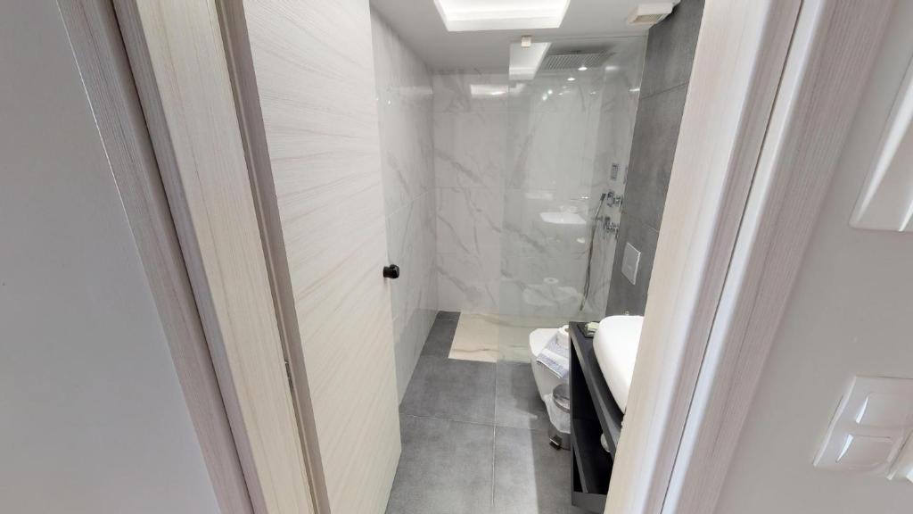 Kúpeľňa v ubytovaní Porto Enetiko Suites