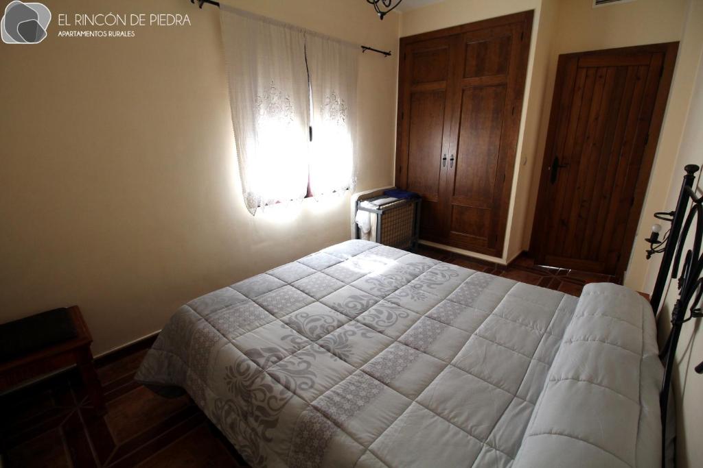 Postel nebo postele na pokoji v ubytování El Rincon de Piedra