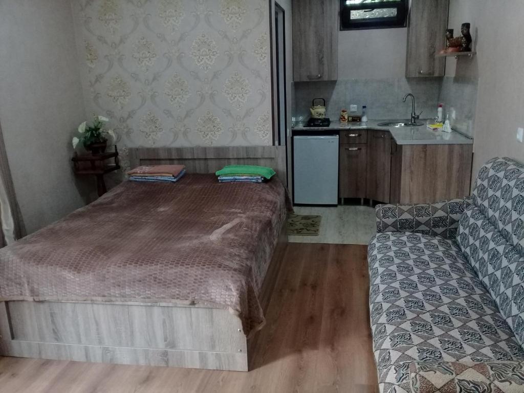 Postel nebo postele na pokoji v ubytování zeiko s guesthouse