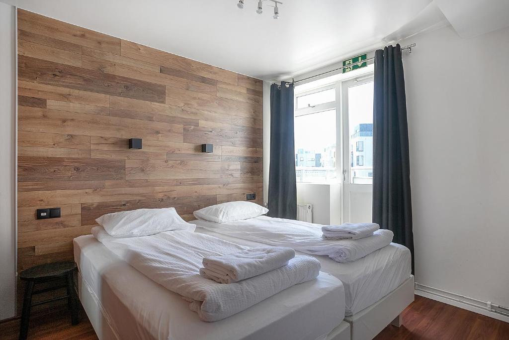 Postel nebo postele na pokoji v ubytování Stay Apartments Einholt