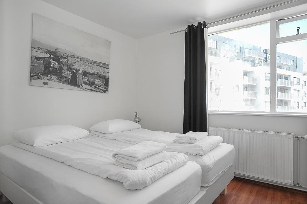 Postel nebo postele na pokoji v ubytování Stay Apartments Einholt