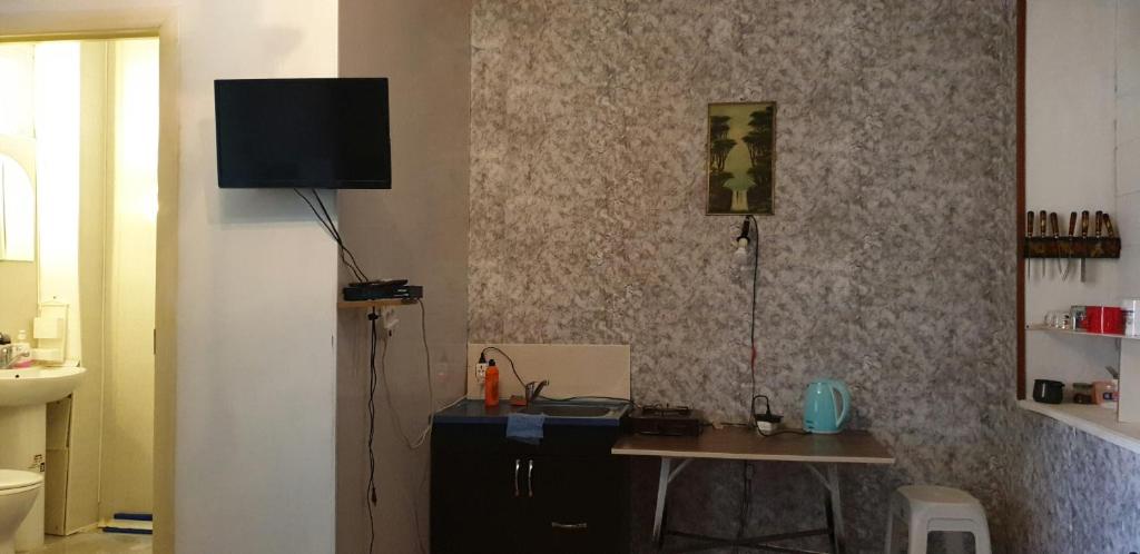 TV a/nebo společenská místnost v ubytování Babibu