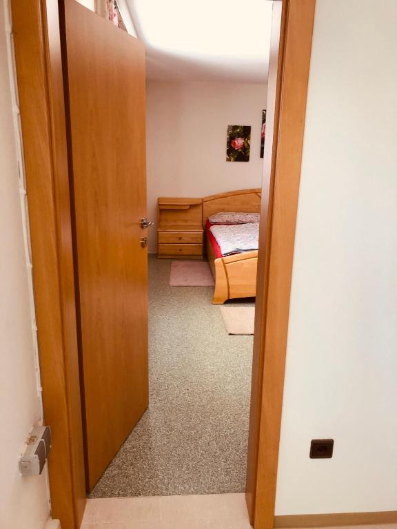Postel nebo postele na pokoji v ubytování Ferienwohnung Klampfermühle
