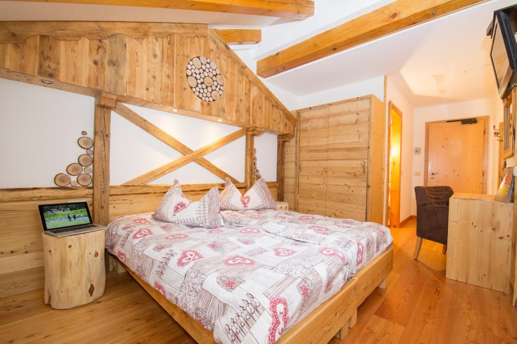 Postel nebo postele na pokoji v ubytování Baita Velon
