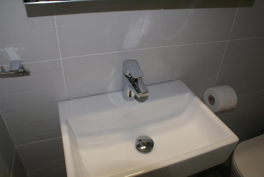 Koupelna v ubytování Nostos Rooms Ammouliani