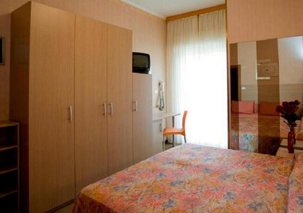 Postel nebo postele na pokoji v ubytování Hotel Ida