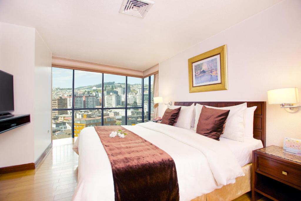 Postel nebo postele na pokoji v ubytování Hotel Rio Amazonas