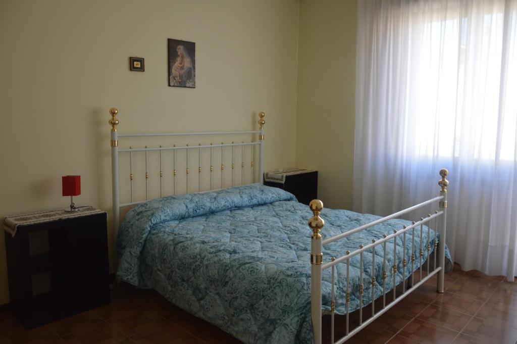 Postel nebo postele na pokoji v ubytování Appartamento in paese